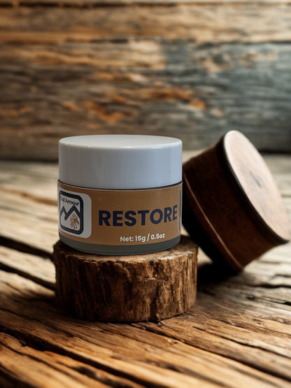 Trail Armour RESTORE overnight lip treatment, 15g jar on weathered timber